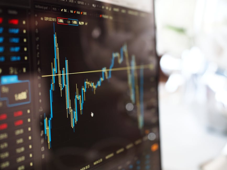 pexels-photo-159888-159888 Detailed view of financial trading graphs on a monitor, illustrating stock market trends.