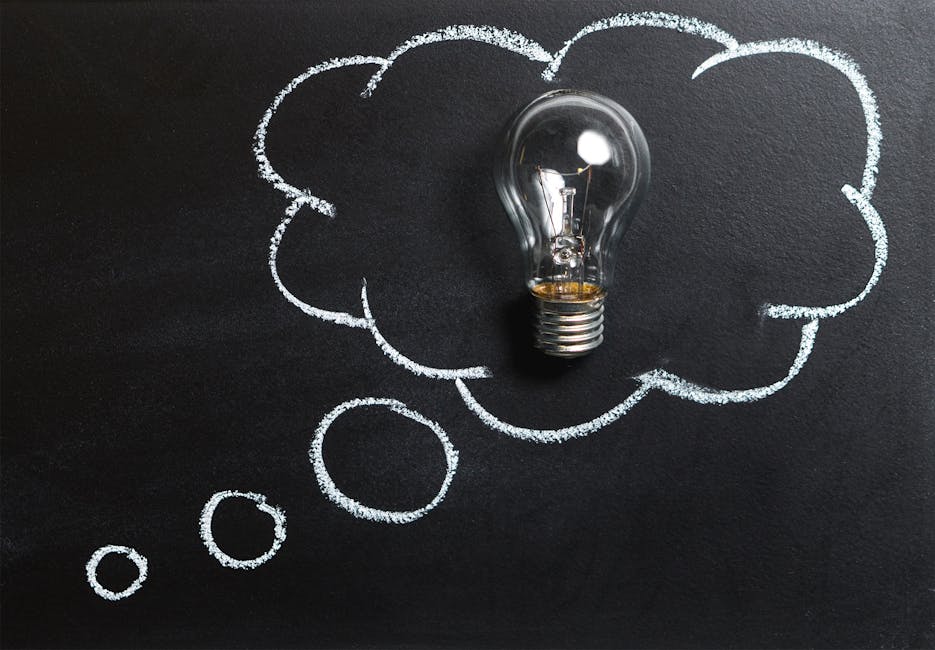 pexels-photo-355952-355952-1 Light bulb laying on chalkboard with drawn thought bubble, symbolizing creative ideas.